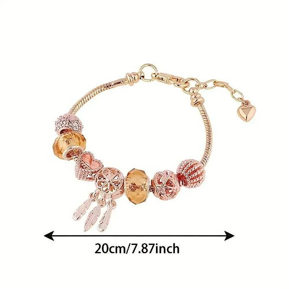 Chic Gold Tone Charm Bracelet Boho Feathers, Sparkle Crystal, and Ornate Beads